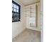 Walk-in closet with built-in storage and natural light at 706 Barrington Hills Dr, Atlanta, GA 30350