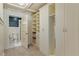 Spacious walk-in closet with custom shelving and access to bathroom at 706 Barrington Hills Dr, Atlanta, GA 30350
