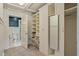 Bright walk-in closet featuring custom organization and adjacent bath access at 706 Barrington Hills Dr, Atlanta, GA 30350