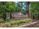 Elegant stone sign marks the entrance to Barrington Hills at Grogans Bluff at 706 Barrington Hills Dr, Atlanta, GA 30350