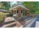 Charming brick and stone guard house welcomes residents and guests to the community at 706 Barrington Hills Dr, Atlanta, GA 30350