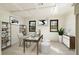 Bright office with desk and shelves and natural light from windows at 706 Barrington Hills Dr, Atlanta, GA 30350