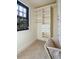 Bright walk-in closet with custom shelving, drawers and window at 706 Barrington Hills Dr, Atlanta, GA 30350