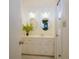 Bright bathroom featuring a vanity with cabinets, two decorative mirrors and tiled floors at 5235 Pounds S Dr, Stone Mountain, GA 30087
