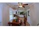 Eat-in kitchen with updated appliances, neutral colors, and convenient access to dining area at 5235 Pounds S Dr, Stone Mountain, GA 30087