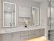 Modern bathroom with double vanity and framed mirrors at 574 Boulevard Ne Pl # 14, Atlanta, GA 30308