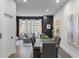 A dining room with seating for six, with bright natural light and an elegant and airy feel at 574 Boulevard Ne Pl # 14, Atlanta, GA 30308