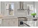The spacious kitchen includes an island with counter seating and stainless steel appliances at 574 Boulevard Ne Pl # 14, Atlanta, GA 30308