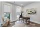 Cozy office space with a modern desk, unique chair, and large windows at 574 Boulevard Ne Pl # 14, Atlanta, GA 30308