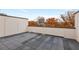 Rooftop deck featuring gray interlocking tile, and an open view at 574 Boulevard Ne Pl # 14, Atlanta, GA 30308