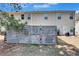 View of the backyard with privacy fence, grassy area, and the rear of the house at 6036 Oakley Rd, Union City, GA 30291