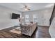 Living room boasts modern decor, hardwood floors, and great natural light at 6036 Oakley Rd, Union City, GA 30291