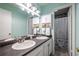 Bathroom featuring double sinks and a shower and tub combo at 2516 Bradford Ne Sq, Atlanta, GA 30345
