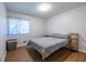 Bedroom with wood floors, a window for natural light, and wardrobe at 2516 Bradford Ne Sq, Atlanta, GA 30345