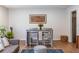 Charming dining area with a table, chairs, artwork, and plants, creating an inviting space for meals at 2516 Bradford Ne Sq, Atlanta, GA 30345