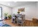 Bright dining area with a wooden table, four chairs, and natural light, perfect for enjoying meals at 2516 Bradford Ne Sq, Atlanta, GA 30345