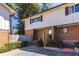 Charming exterior view featuring a brick facade and well-maintained landscaping, offering a welcoming curb appeal at 2516 Bradford Ne Sq, Atlanta, GA 30345