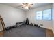 Carpeted gym space with weights, bench, equipment, and natural light at 2516 Bradford Ne Sq, Atlanta, GA 30345