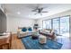 Bright living room with modern decor, stylish furniture, and sliding glass doors, perfect for relaxing and entertaining at 2516 Bradford Ne Sq, Atlanta, GA 30345