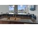 Enjoy city views from this modern kitchen with granite countertops and stainless sink at 400 W Peachtree Nw St # 2604, Atlanta, GA 30308