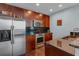 This sleek kitchen features stainless steel appliances and granite countertops at 400 W Peachtree Nw St # 2604, Atlanta, GA 30308