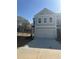 Charming two-story home with a two-car garage and a spacious driveway at 5193 Longview Run, Decatur, GA 30035