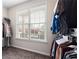 Walk-in closet with a large window providing plenty of natural light at 65 Turtle Rock Cv, Acworth, GA 30101