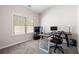Home office with ample natural light and functional desk setup at 65 Turtle Rock Cv, Acworth, GA 30101
