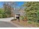Charming home featuring a two-car garage, a wide driveway, and beautiful architectural details at 931 Cornwall Sw Ct, Marietta, GA 30064