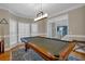 This game room features a traditional style pool table, and recessed lighting at 931 Cornwall Sw Ct, Marietta, GA 30064