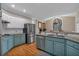 Eat-in kitchen features granite countertops, stainless steel appliances, and natural light at 931 Cornwall Sw Ct, Marietta, GA 30064