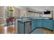 Eat-in kitchen features granite countertops, stainless steel appliances, and breakfast bar at 931 Cornwall Sw Ct, Marietta, GA 30064