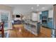 Eat-in kitchen features granite countertops, stainless steel appliances, and breakfast bar at 931 Cornwall Sw Ct, Marietta, GA 30064