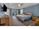 Bright primary bedroom with carpet, walk-in closet and ensuite bathroom through sliding barn door at 931 Cornwall Sw Ct, Marietta, GA 30064