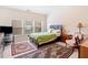 Bedroom with natural light, decor rugs and a TV at 2105 Caswell Cir # 185, Marietta, GA 30060