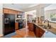 Well-equipped kitchen with stainless steel appliances and a view of the dining area at 2105 Caswell Cir, Marietta, GA 30060