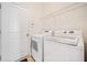 A clean laundry room with washer and dryer at 2105 Caswell Cir, Marietta, GA 30060