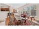 Bright living room featuring hardwood floors, large windows, and elegant furniture arrangement at 2105 Caswell Cir, Marietta, GA 30060