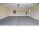 Two car garage with concrete floors, storage shelves and plenty of room at 341 Ridge Hill Cir # 4, Marietta, GA 30064