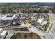 Stunning aerial view of a mixed-use development with residential, retail, and green spaces at 6682 Sterling Dr, Atlanta, GA 30328