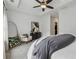 Neutral bedroom with tray ceiling, ceiling fan, carpet, and modern decor at 6682 Sterling Dr, Atlanta, GA 30328