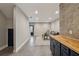 View from the kitchen, featuring an open living room floor plan with modern decor and a staircase at 6682 Sterling Dr, Atlanta, GA 30328