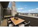 Charming patio with fireplace feature, outdoor seating and scenic neighborhood views at 6682 Sterling Dr, Atlanta, GA 30328