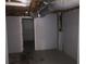 Unfinished basement with exposed ducts and utilities at 6831 Lismore Dr, Norcross, GA 30093