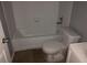 A bathroom with a bathtub and toilet at 6831 Lismore Dr, Norcross, GA 30093