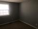 A bedroom with a window at 6831 Lismore Dr, Norcross, GA 30093
