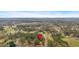 Aerial view of a house and surrounding area, ideal for showing location with trees and neighborhood at 12 Remington Ct, Euharlee, GA 30145