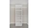 Well-organized closet featuring built-in shelving for storage solutions at 12 Remington Ct, Euharlee, GA 30145