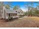 Charming home featuring a covered front porch, neutral siding, and landscaped yard at 12 Remington Ct, Euharlee, GA 30145