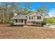 Charming home with a welcoming porch, well-maintained landscaping, and classic architectural features at 12 Remington Ct, Euharlee, GA 30145